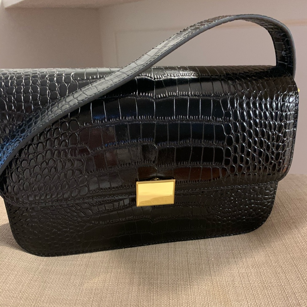 Black leather bag from The Curated.